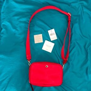 true red Kate Spade crossbody bag